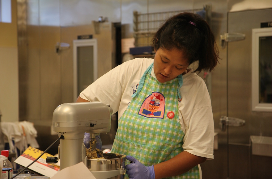 Kimberly Ferry, who had endured years of homelessness and mental-health struggles, working at the Altamont Bakery in Tulsa. (Courtesy of Congregation B'nai Emunah)