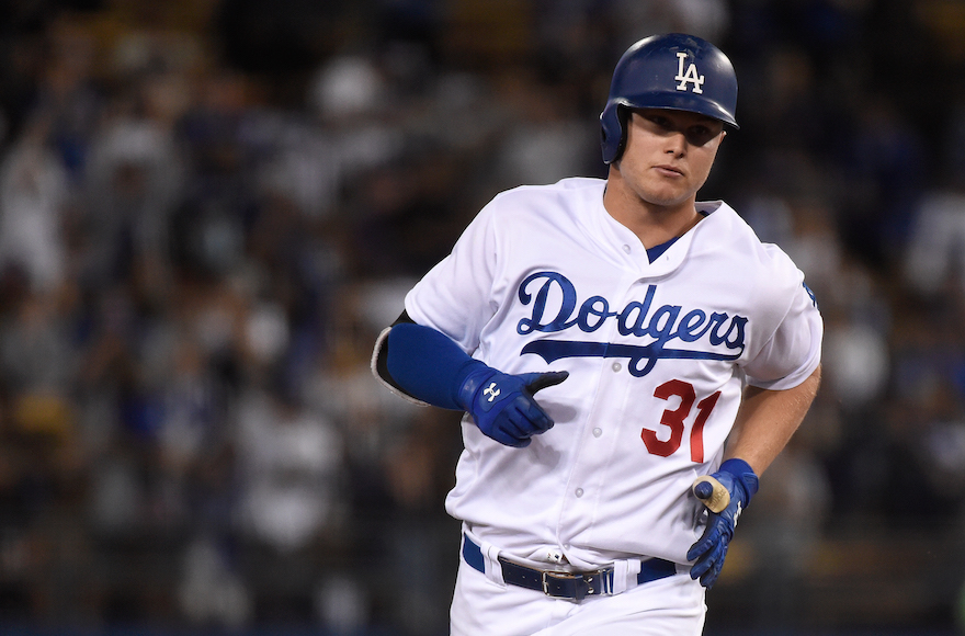 Joc Pederson after after hitting a solo home run in a game against the Colorado Rockies at Dodger Stadium in Los Angeles, Sept. 23, 2016. (Lisa Blumenfeld/Getty Images)